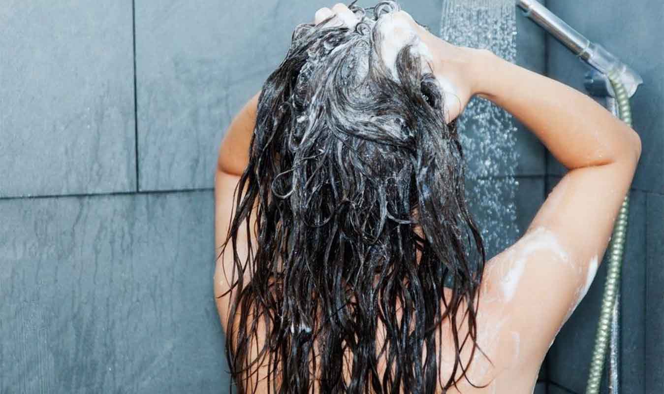 Here’s how hot showers are damaging your hair